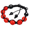 Náramek s červenými krystaly a černými korálky, nastavitelný, průměr korálků 12 mm, elegantní design pro každodenní nošení.